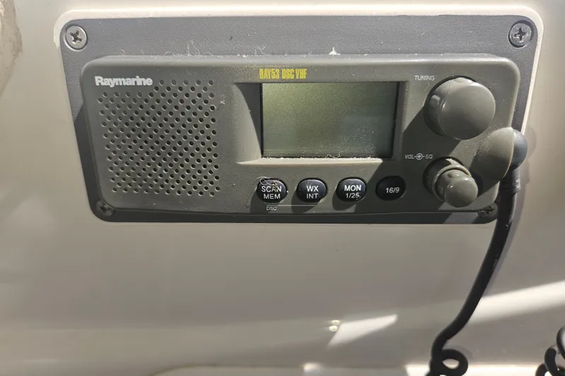 Slide: The Image of Raymarine marine radio on 2005 Meridian 368 Motoryacht dashboard. - 47