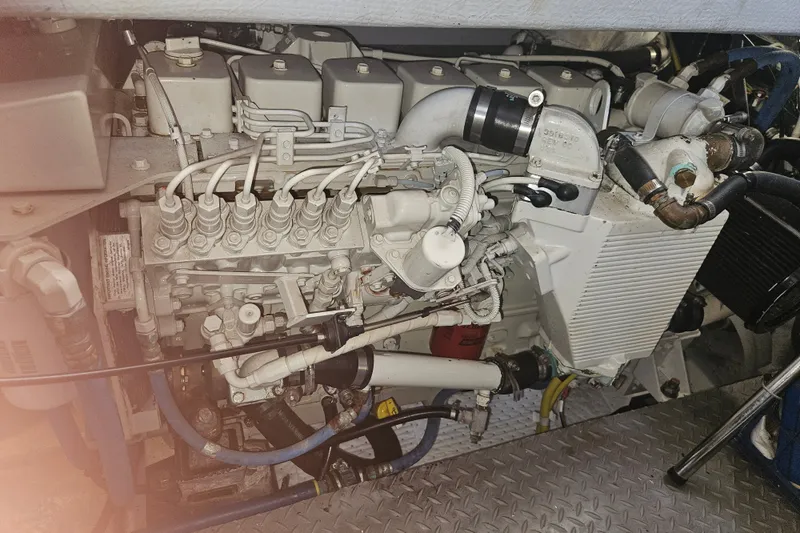Slide: The Image of Engine compartment of a 2005 Meridian 368 Motoryacht, showcasing intricate mechanical components. - 67