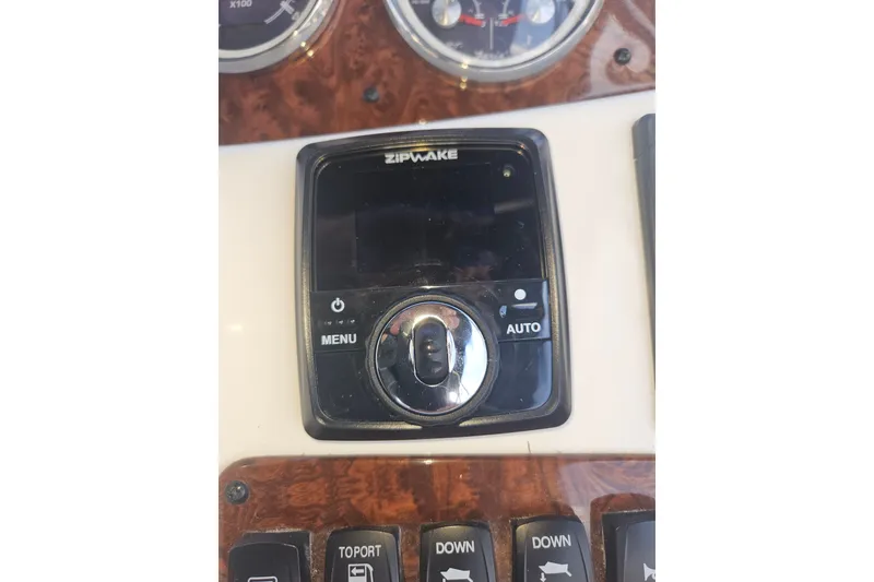 Slide: The Image of Control panel of a 2005 Meridian 368 Motoryacht featuring Zipwake system. - 46