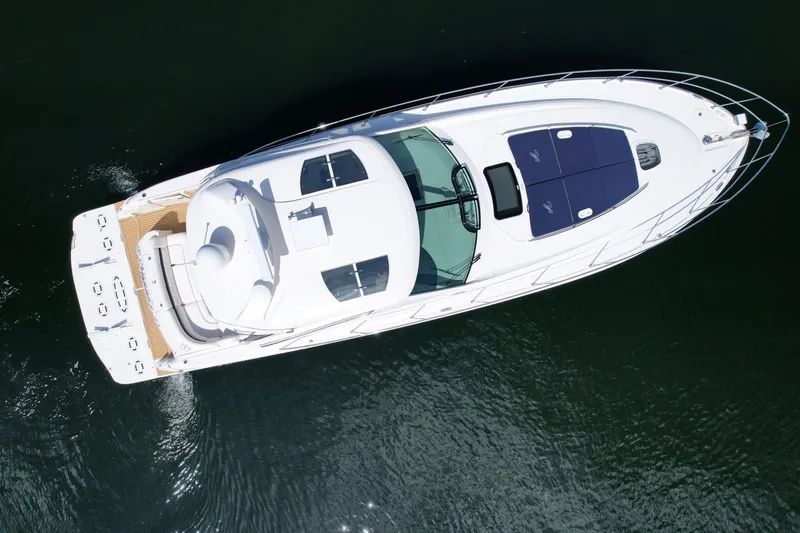 Slide: The Image of Aerial view of 2007 Sea Ray 48 Sundancer yacht on calm water. - 7