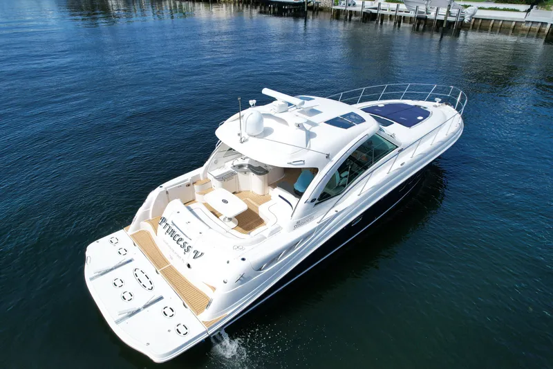 Slide: The Image of 2007 Sea Ray 48 Sundancer yacht cruising on calm waters, aerial view. - 5