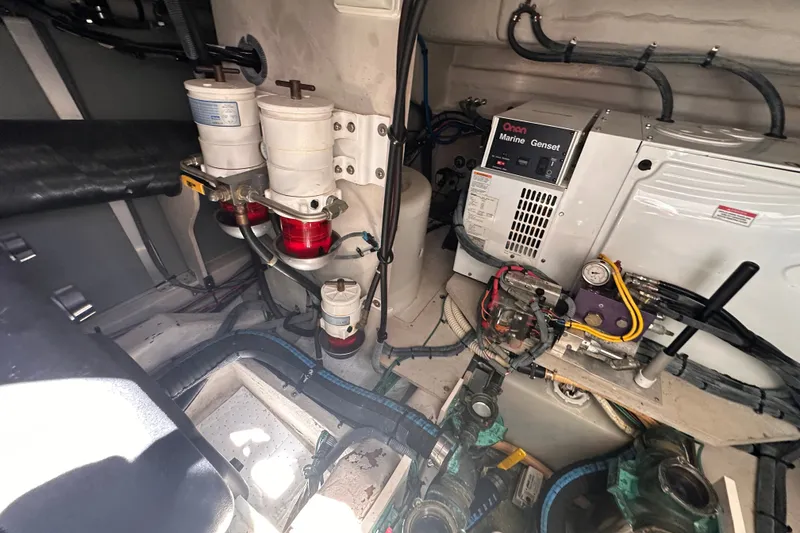 Slide: The Image of Engine room of 2007 Sea Ray 48 Sundancer with Onan Marine Genset and fuel filters. - 71