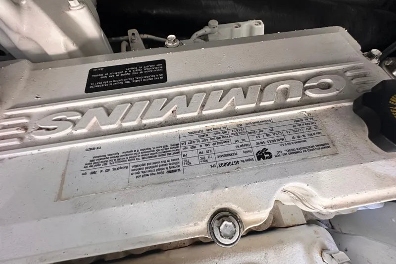 Slide: The Image of Engine of a 2007 Sea Ray 48 Sundancer with Cummins branding visible. - 76