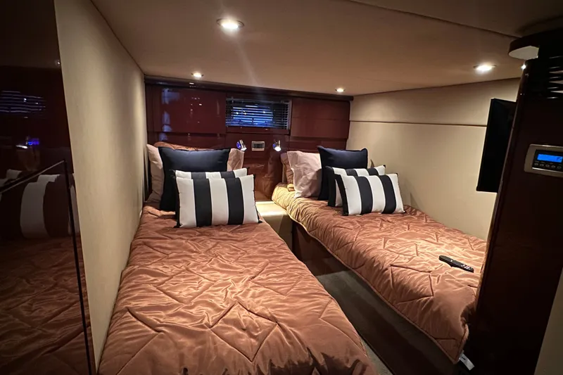 Slide: The Image of Luxurious twin cabin interior of 2007 Sea Ray 48 Sundancer yacht. - 47