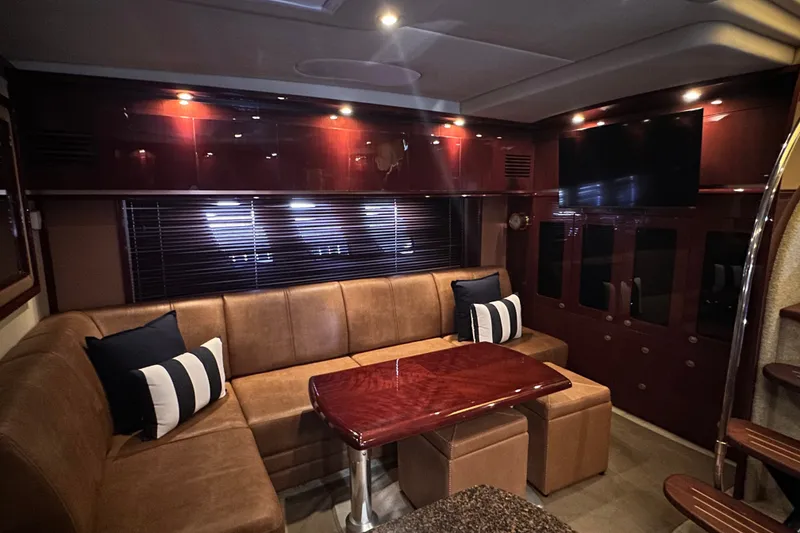 Slide: The Image of Luxurious interior of 2007 Sea Ray 48 Sundancer yacht with leather seating and elegant wood finishes. - 42