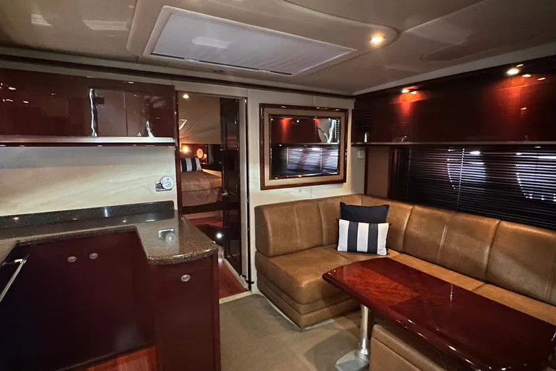 Slide: The Image of Luxurious interior of 2007 Sea Ray 48 Sundancer yacht with leather seating and modern kitchen. - 40