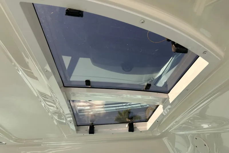 Slide: The Image of Sunroof of 2007 Sea Ray 48 Sundancer yacht, showcasing sleek design and natural light. - 23