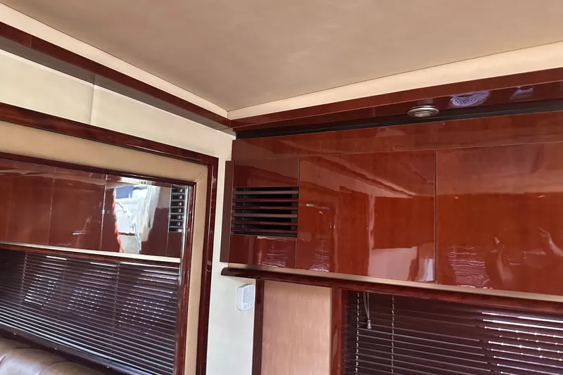 Slide: The Image of Luxurious wood interior of 2007 Sea Ray 48 Sundancer yacht cabin. - 57
