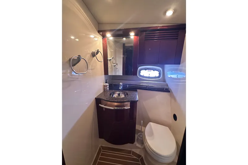 Slide: The Image of Luxurious bathroom interior of 2007 Sea Ray 48 Sundancer yacht with modern fixtures. - 30