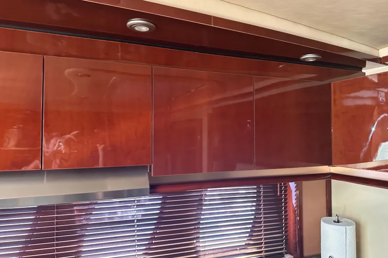 Slide: The Image of Luxurious wooden cabinetry in 2007 Sea Ray 48 Sundancer yacht interior. - 62
