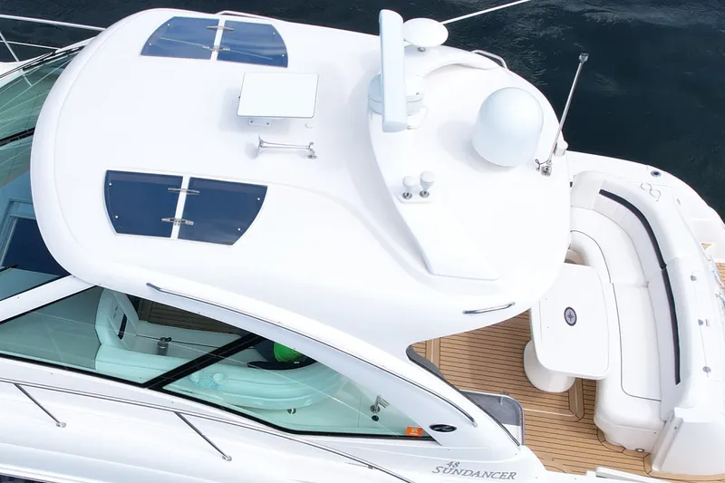 Slide: The Image of 2007 Sea Ray 48 Sundancer yacht with sleek design and spacious deck. - 29