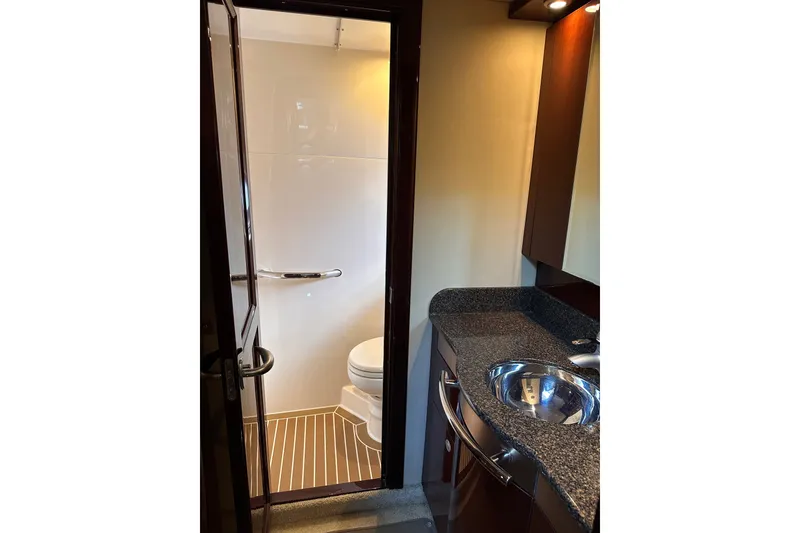 Slide: The Image of Luxurious bathroom interior of 2007 Sea Ray 48 Sundancer yacht with modern fixtures. - 51
