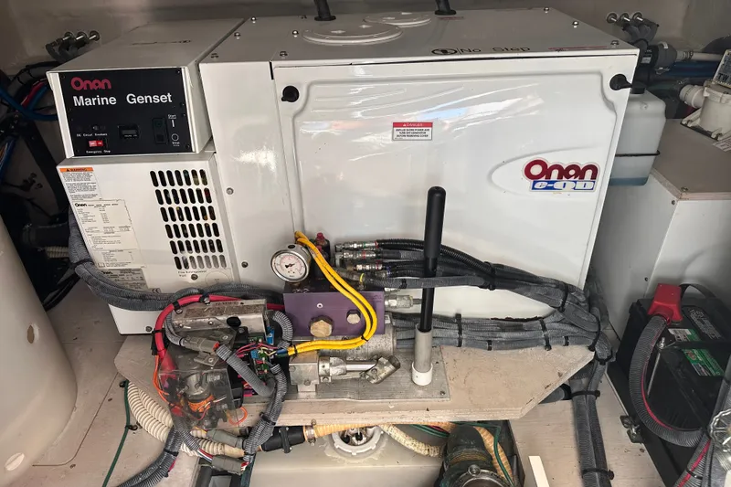 Slide: The Image of Onan marine generator in 2007 Sea Ray 48 Sundancer engine room. - 66