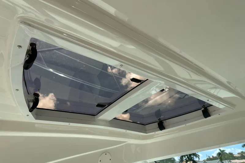 Slide: The Image of Skylight on 2007 Sea Ray 48 Sundancer yacht, showcasing clear sky reflection. - 24