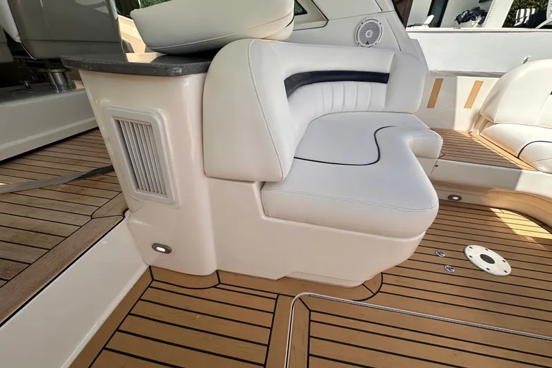 Slide: The Image of Luxurious seating on 2007 Sea Ray 48 Sundancer yacht with elegant wood flooring. - 18