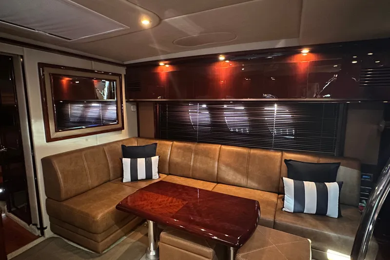 Slide: The Image of Luxurious interior of 2007 Sea Ray 48 Sundancer yacht with leather seating and elegant wood finishes. - 39