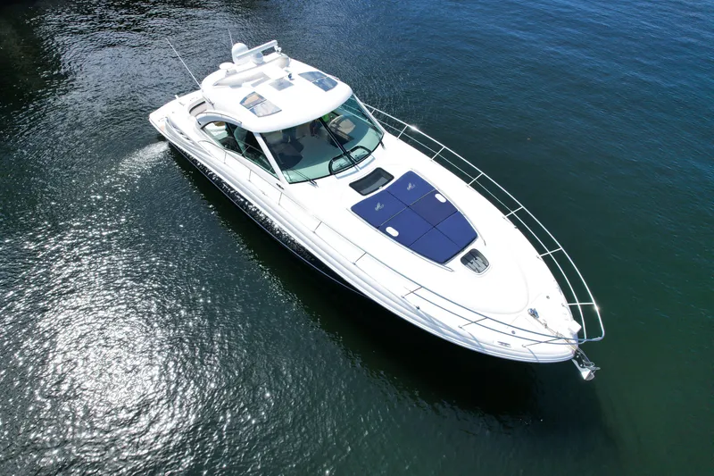 Slide: The Image of 2007 Sea Ray 48 Sundancer yacht cruising on calm waters, aerial view. - 4