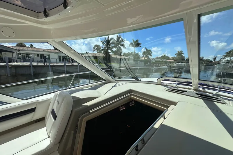Slide: The Image of Interior view of 2007 Sea Ray 48 Sundancer yacht with waterfront scenery. - 25