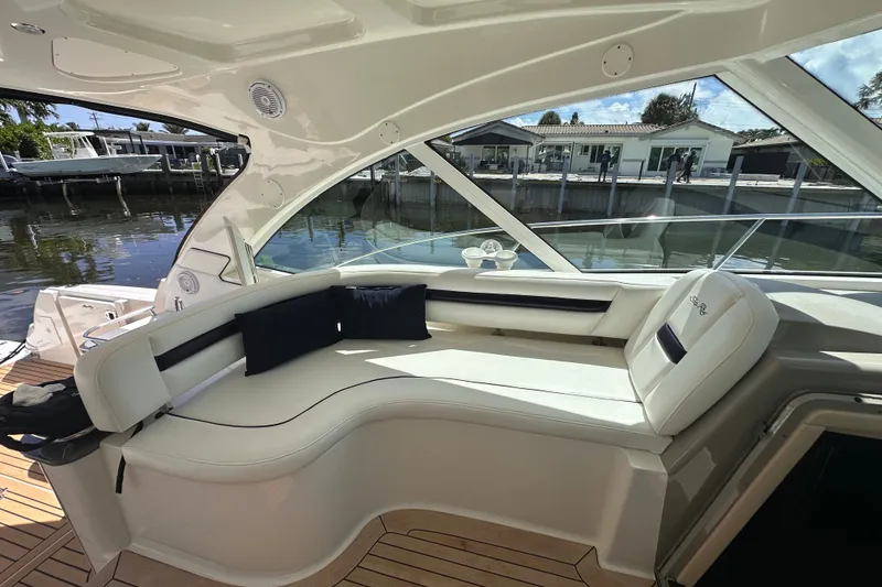 Slide: The Image of Luxurious interior of 2007 Sea Ray 48 Sundancer yacht with elegant seating and waterfront view. - 22