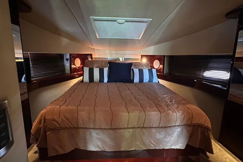 Slide: The Image of Luxurious bedroom interior of 2007 Sea Ray 48 Sundancer yacht with elegant bedding. - 33