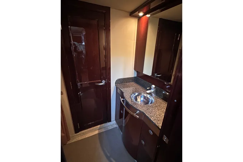 Slide: The Image of Luxurious bathroom interior of 2007 Sea Ray 48 Sundancer yacht with granite countertop. - 46