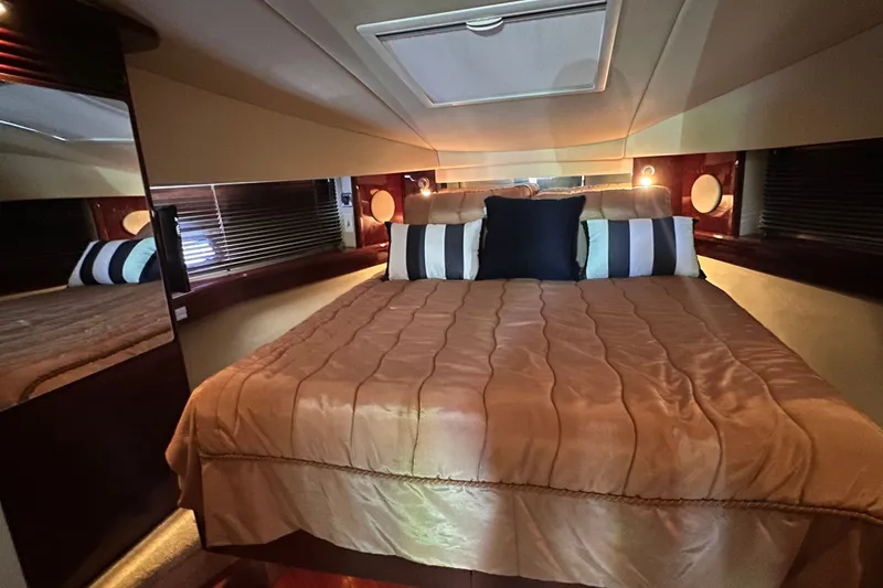 Slide: The Image of Luxurious bedroom interior of 2007 Sea Ray 48 Sundancer yacht with elegant bedding. - 35