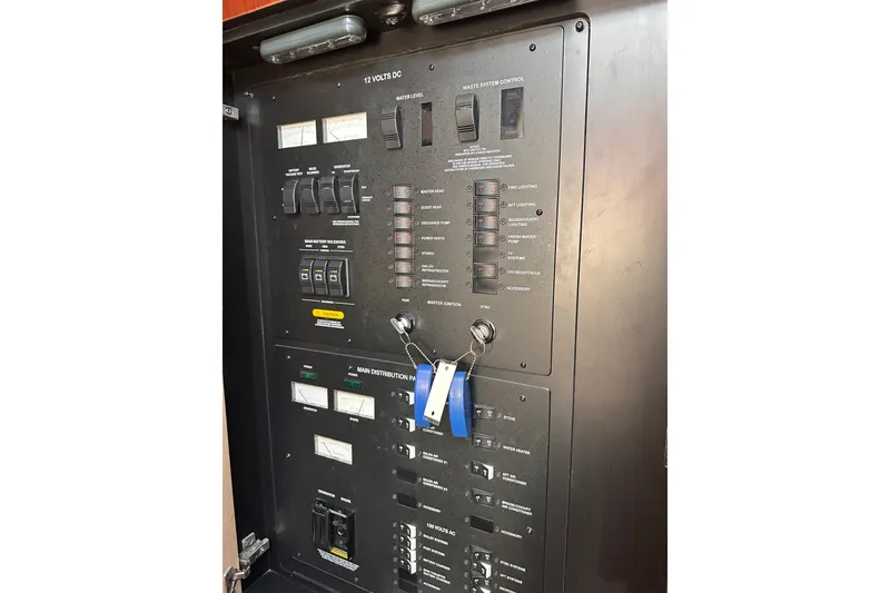 Slide: The Image of Electrical control panel on a 2007 Sea Ray 48 Sundancer yacht. - 53