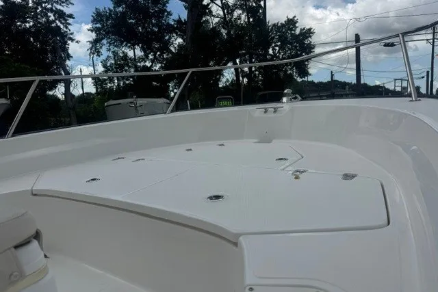 Slide: The Image of 2022 Boston Whaler 190 Montauk boat deck, featuring sleek design and spacious layout. - 16