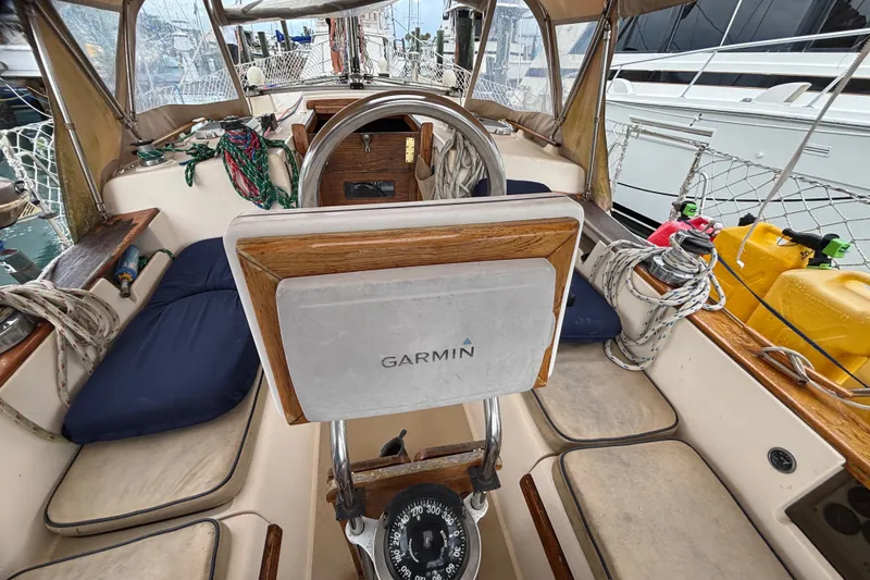 Slide: The Image of Cockpit of 1989 Island Packet 35 sailboat with Garmin navigation system and nautical equipment. - 16