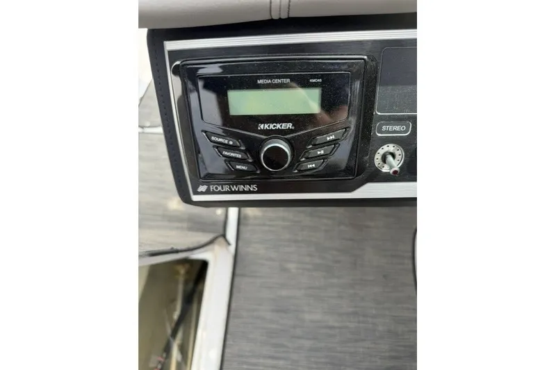 Slide: The Image of 2022 Four Winns HD5 OB boat stereo system with Kicker media center. - 7