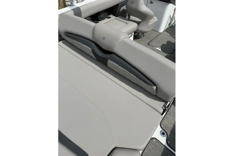 Slide: The Image of 2022 Four Winns HD5 OB boat interior with gray seating and modern design. - 20