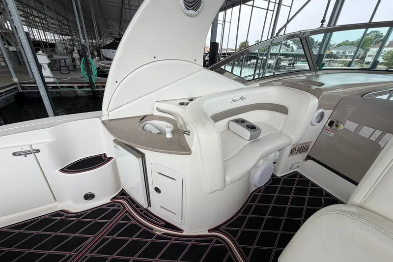 Slide: The Image of 2003 Sea Ray Sundancer 320 interior with seating and built-in sink. - 17