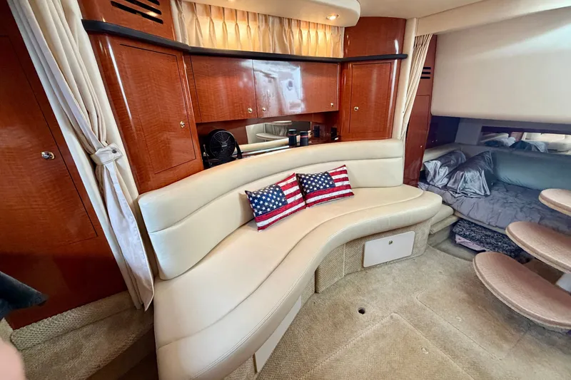 Slide: The Image of Luxurious interior of a 2003 Sea Ray Sundancer 320 yacht with elegant seating and decor. - 27