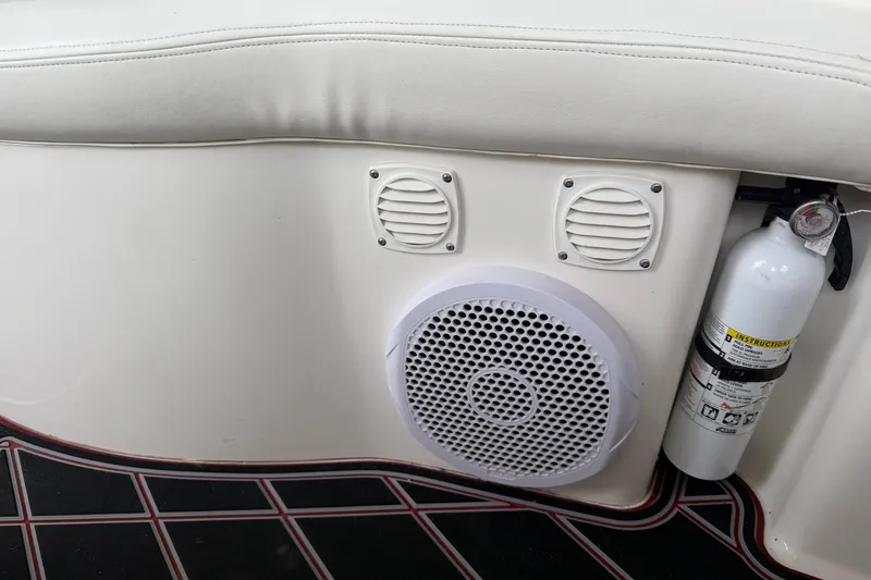 Slide: The Image of Interior of 2003 Sea Ray Sundancer 320 with speaker and fire extinguisher. - 23