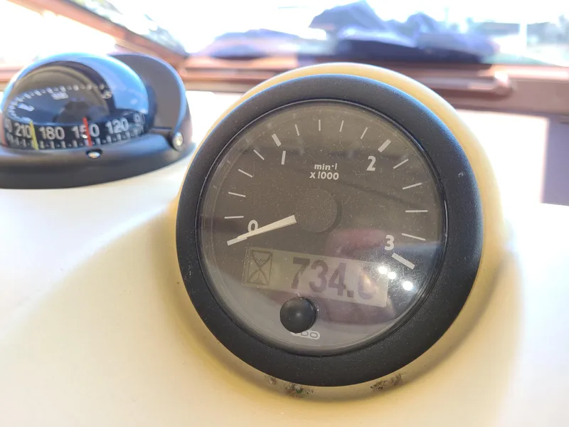Slide: The Image of Close-up of 2011 Azimut 47 boat tachometer and compass. - 18