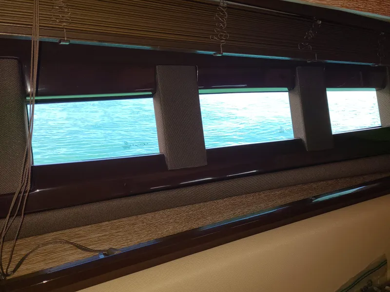 Slide: The Image of Interior window view of 2011 Azimut 47 yacht overlooking the sea. - 47