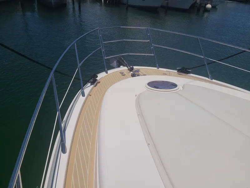 Slide: The Image of Bow view of 2011 Azimut 47 yacht docked in marina. - 3