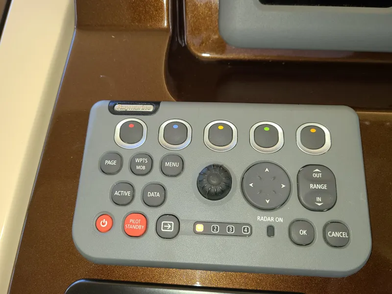 Slide: The Image of Control panel of a 2011 Azimut 47 yacht with various buttons and dials. - 21