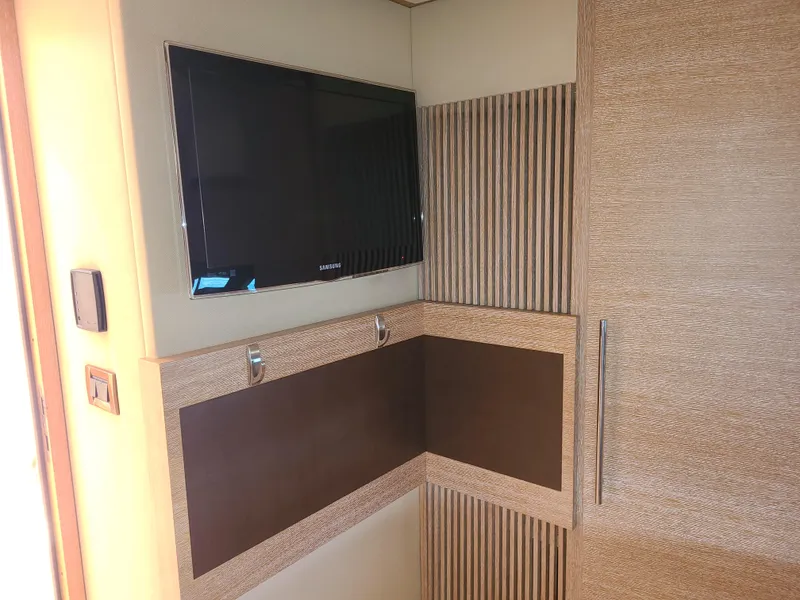 Slide: The Image of Flat-screen TV in the interior of a 2011 Azimut 47 yacht. - 43