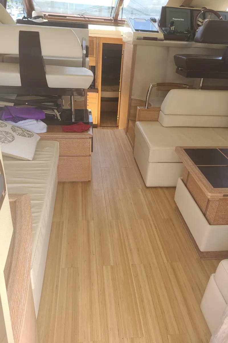 Slide: The Image of Interior of 2011 Azimut 47 yacht with modern seating and wooden flooring. - 33
