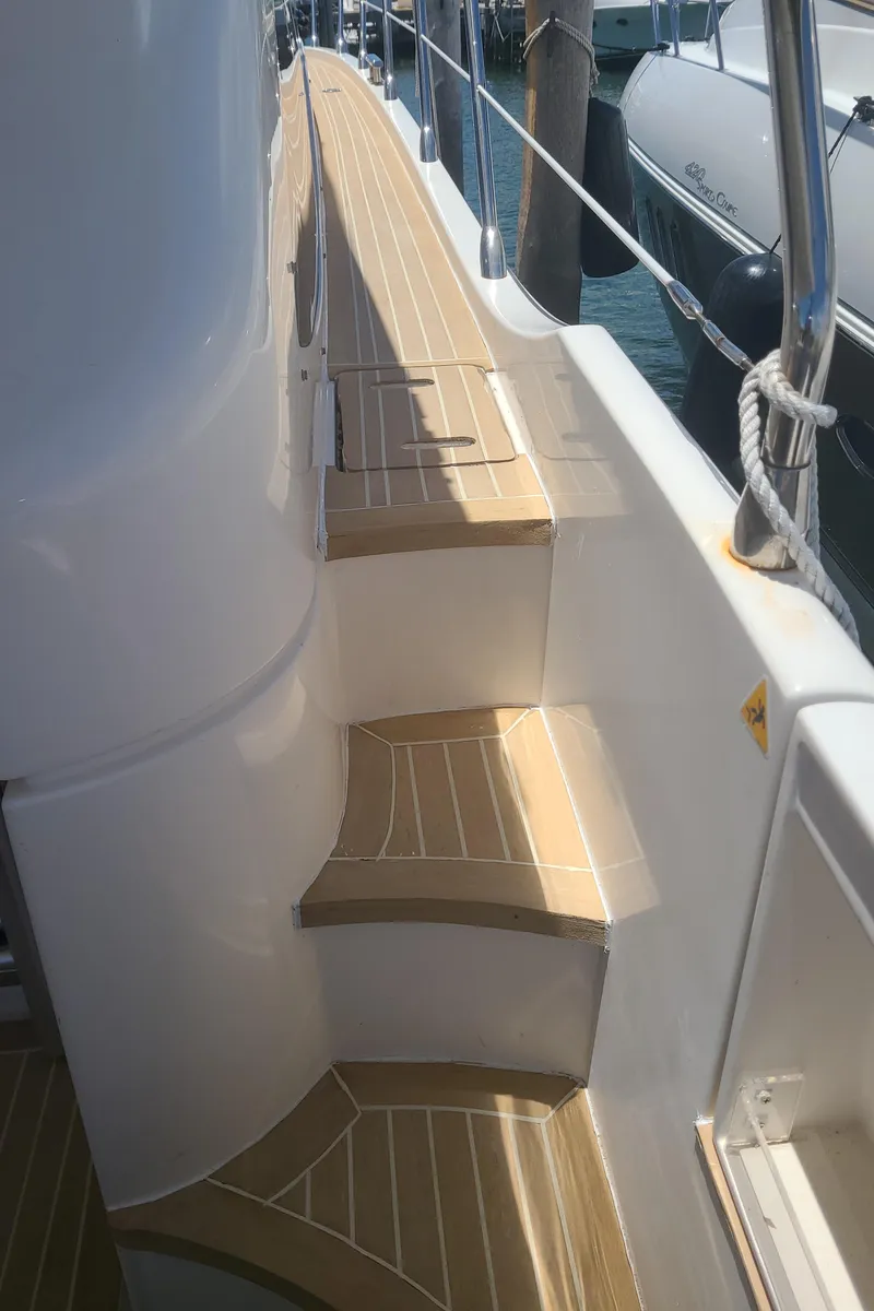 Slide: The Image of Steps on the deck of a 2011 Azimut 47 yacht. - 9