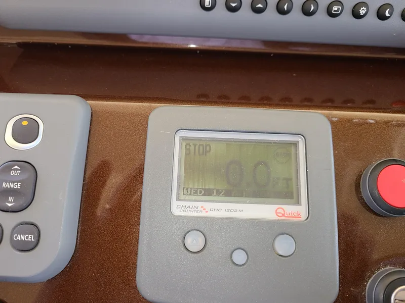 Slide: The Image of Control panel of a 2011 Azimut 47 yacht with digital display and buttons. - 22