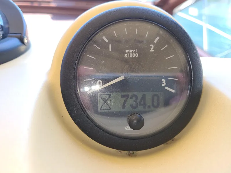 Slide: The Image of Tachometer of 2011 Azimut 47 yacht showing 734.0 hours. - 15