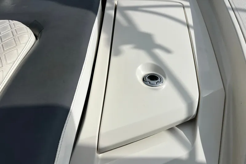 Slide: The Image of Close-up of 2011 Monterey 328SS Super Sport boat interior with seat and storage compartment. - 20