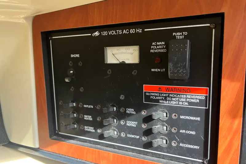 Slide: The Image of Electrical panel of a 2011 Monterey 328SS Super Sport boat with warning indicators. - 39