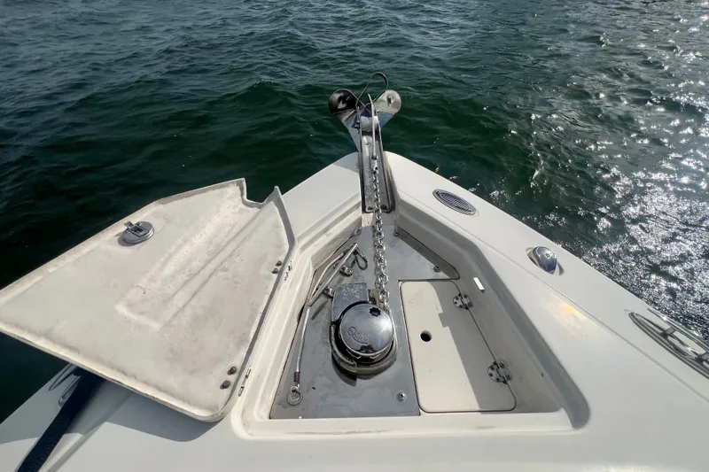 Slide: The Image of Bow of 2011 Monterey 328SS Super Sport boat with anchor chain and open hatch. - 17
