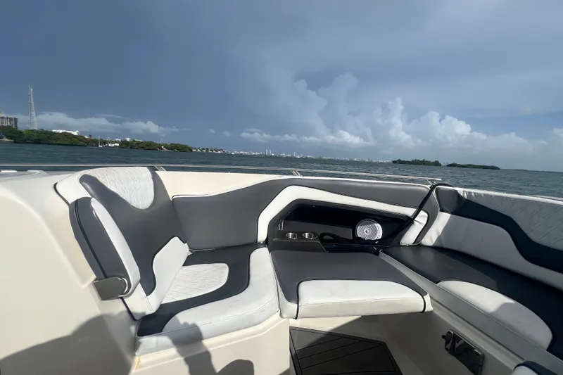 Slide: The Image of Luxurious seating on a 2011 Monterey 328SS Super Sport boat with scenic ocean view. - 14