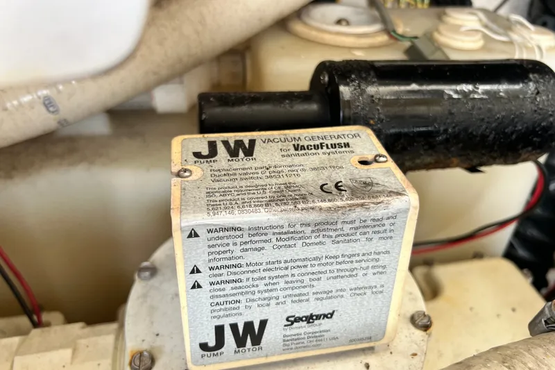 Slide: The Image of JW vacuum generator for VacuFlush sanitation system in a 2011 Monterey 328SS Super Sport. - 43