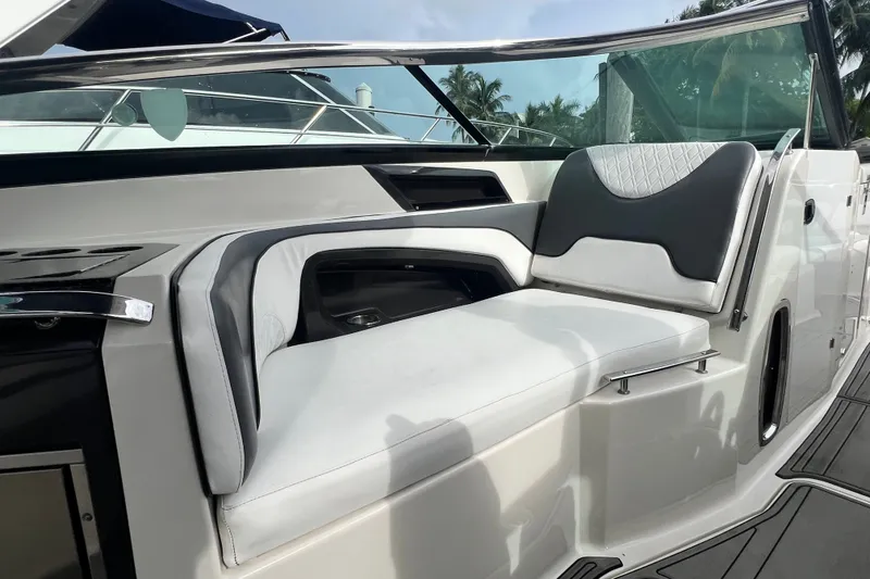 Slide: The Image of Luxurious seating on a 2011 Monterey 328SS Super Sport boat, featuring sleek design and comfort. - 26