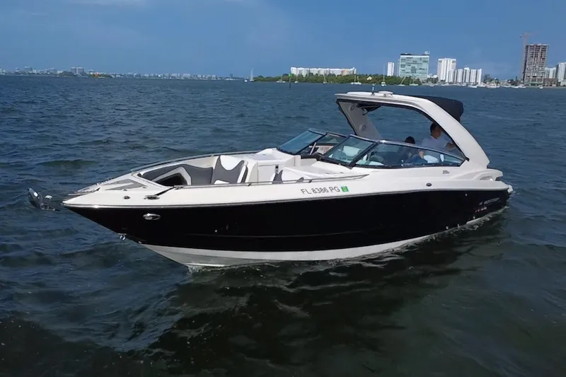 The Image of 2011 Monterey 328SS Super Sport boat cruising on open water. - 0
